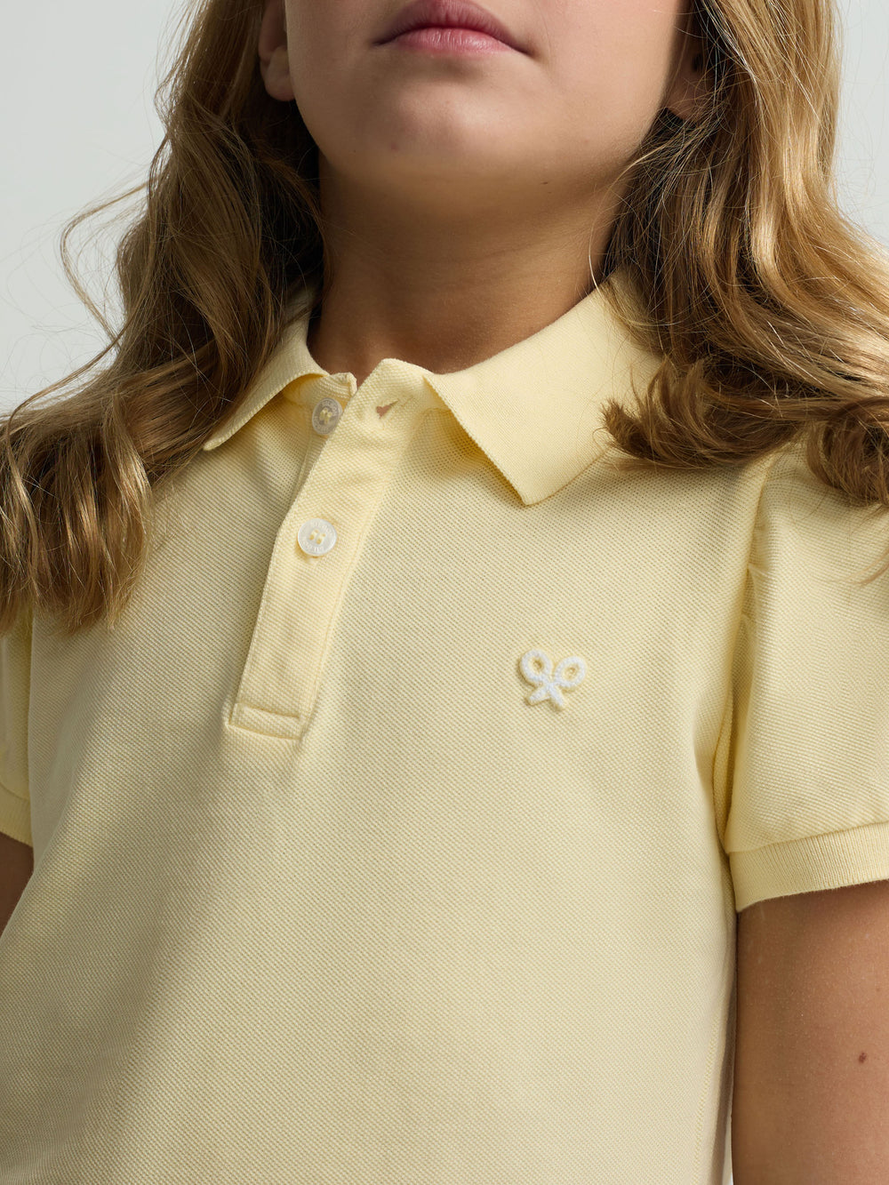 yellow puff-sleeved polo shirt for girls