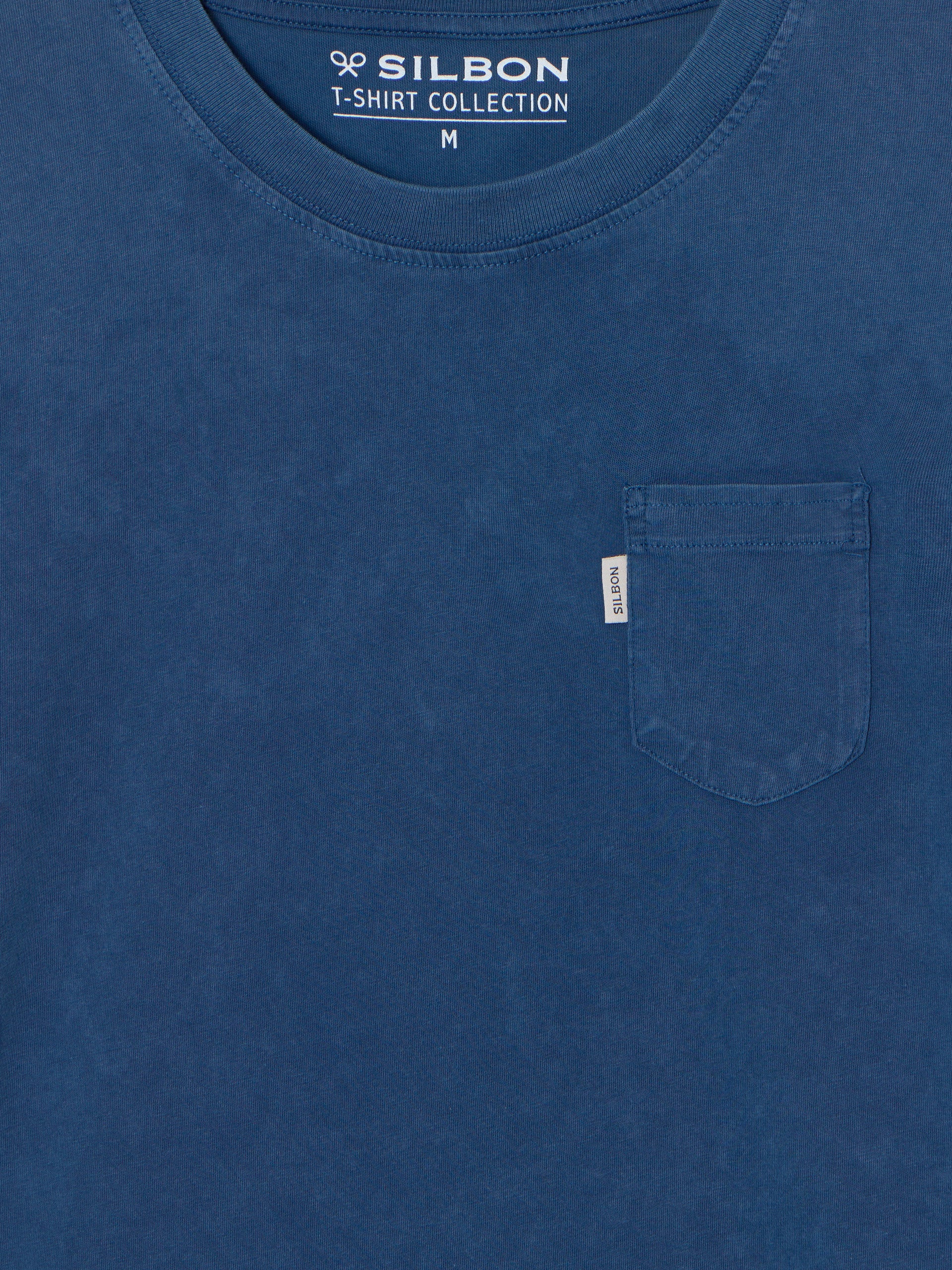 Camiseta silbon lisa bolsillo azul