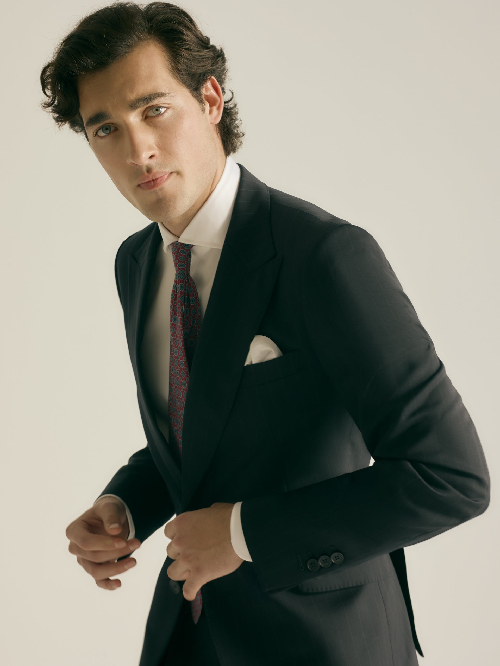 Veste de costume bleu marine à fines rayures