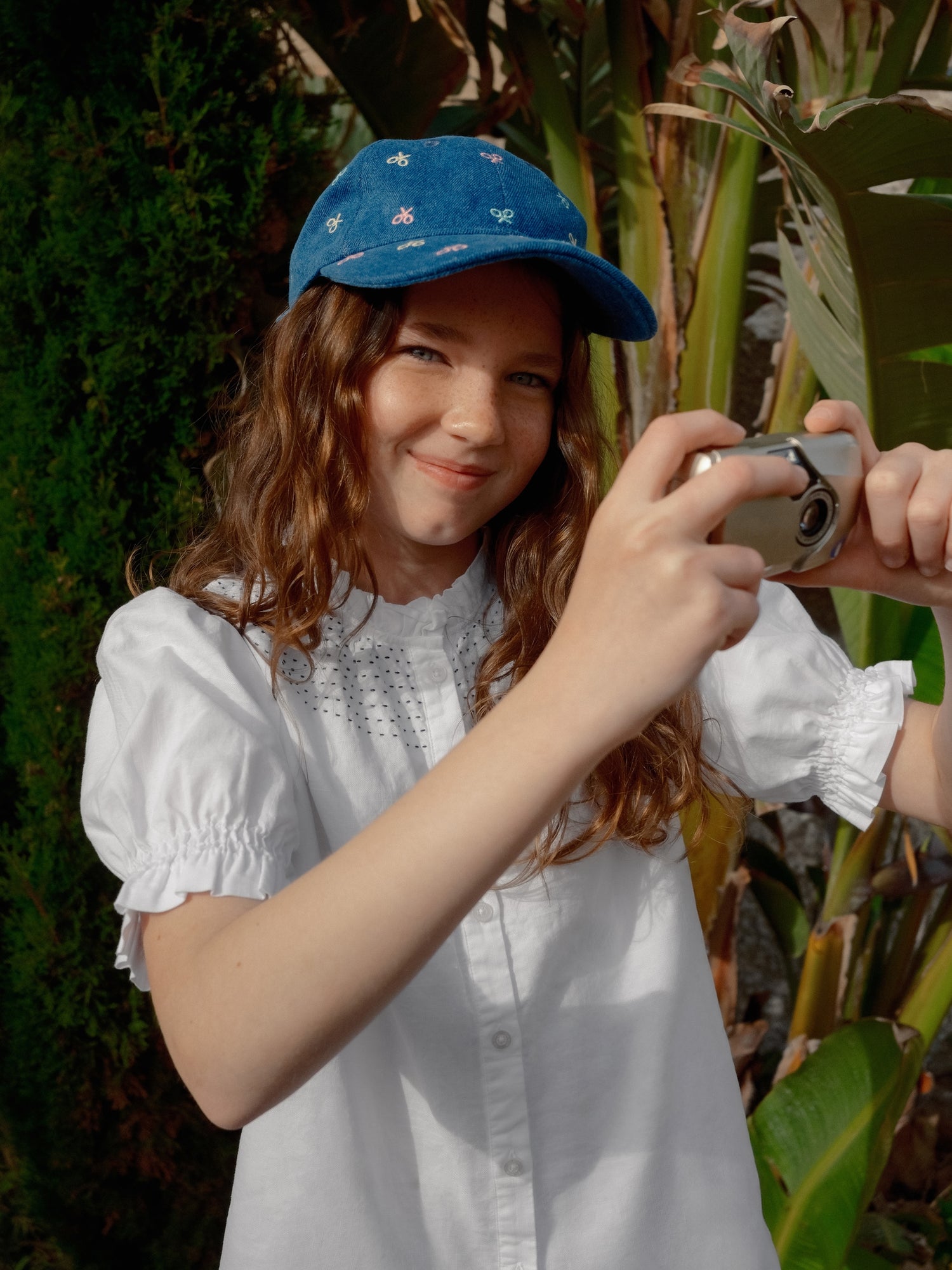 White linen girl's shirt with ruffles