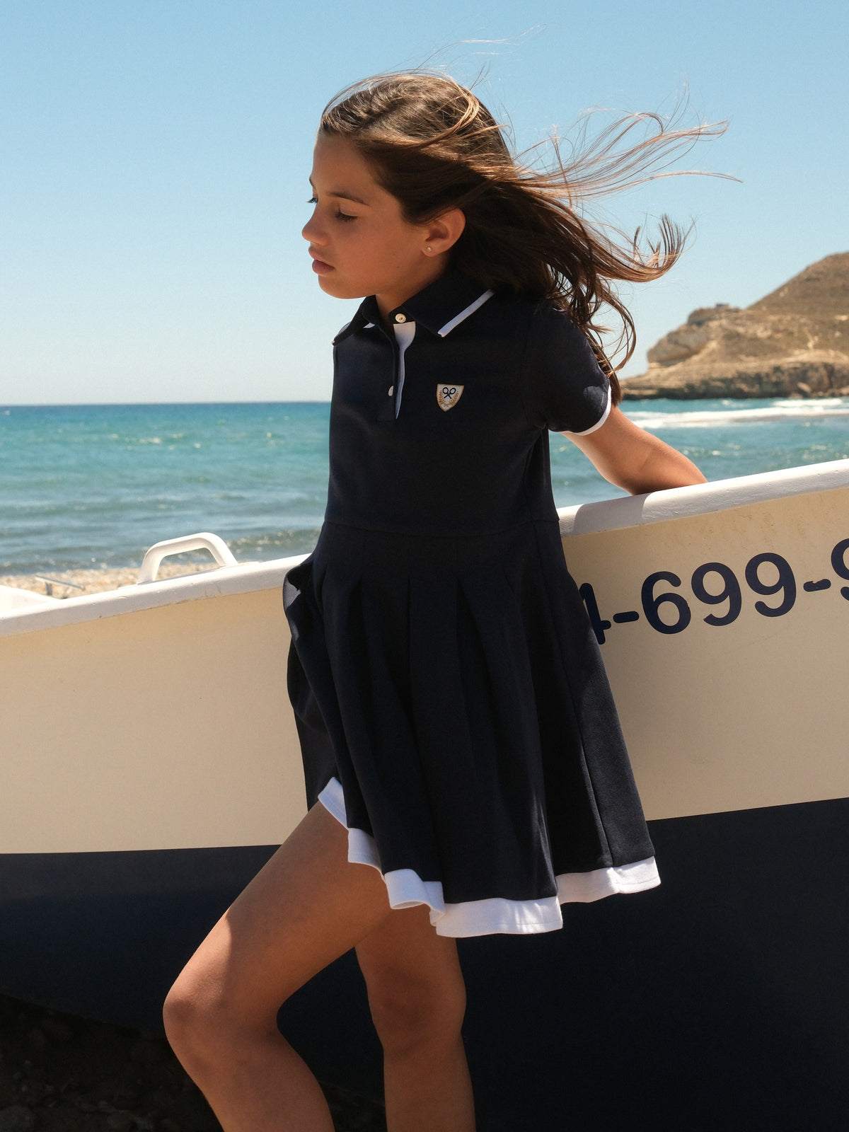 Vestido de menina em malha azul-marinho