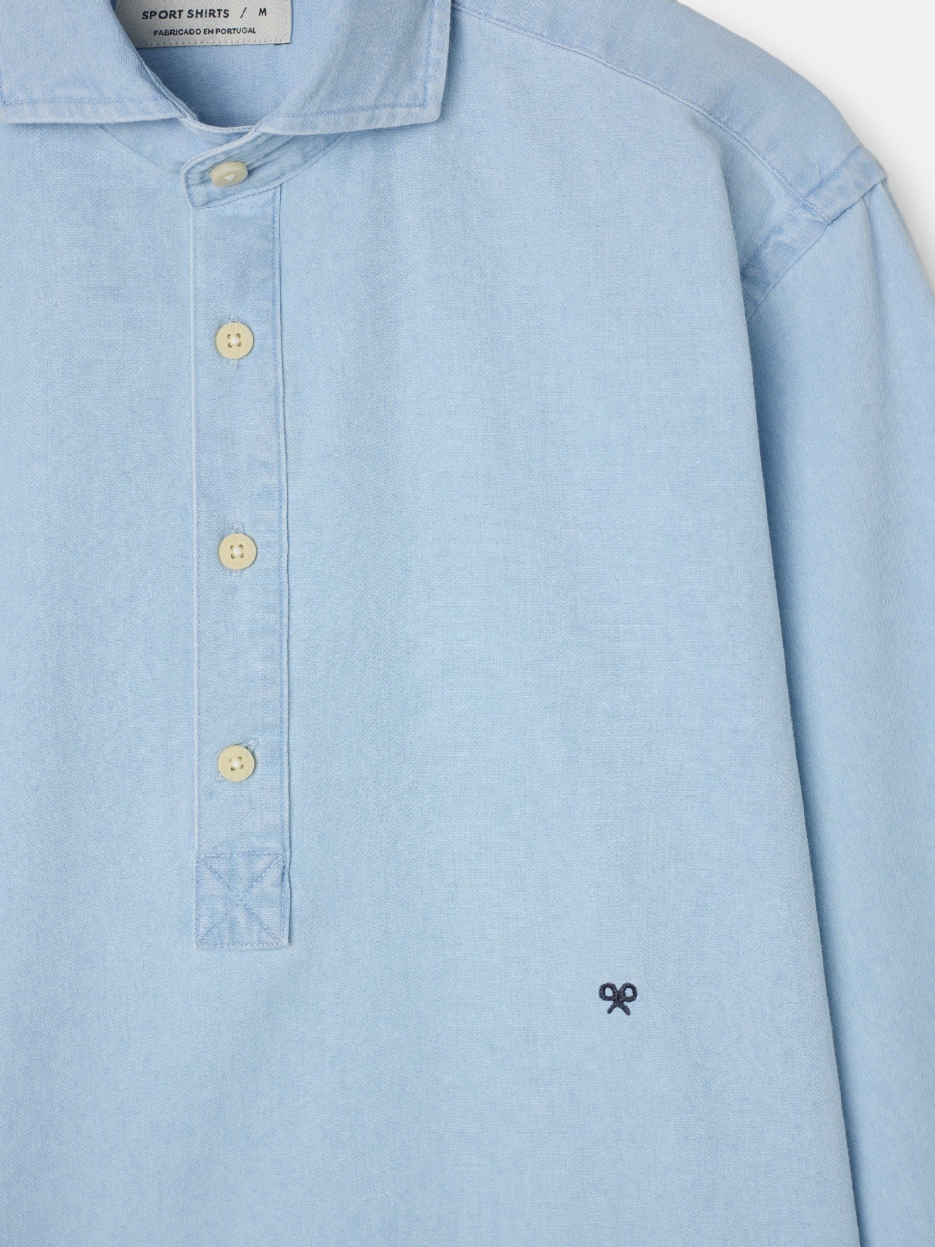 Polera sport denim azul claro