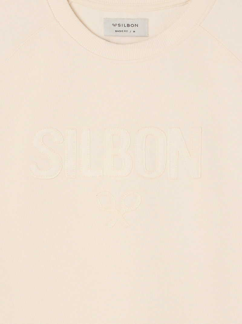 Sweatshirt raglã silbon patch creme