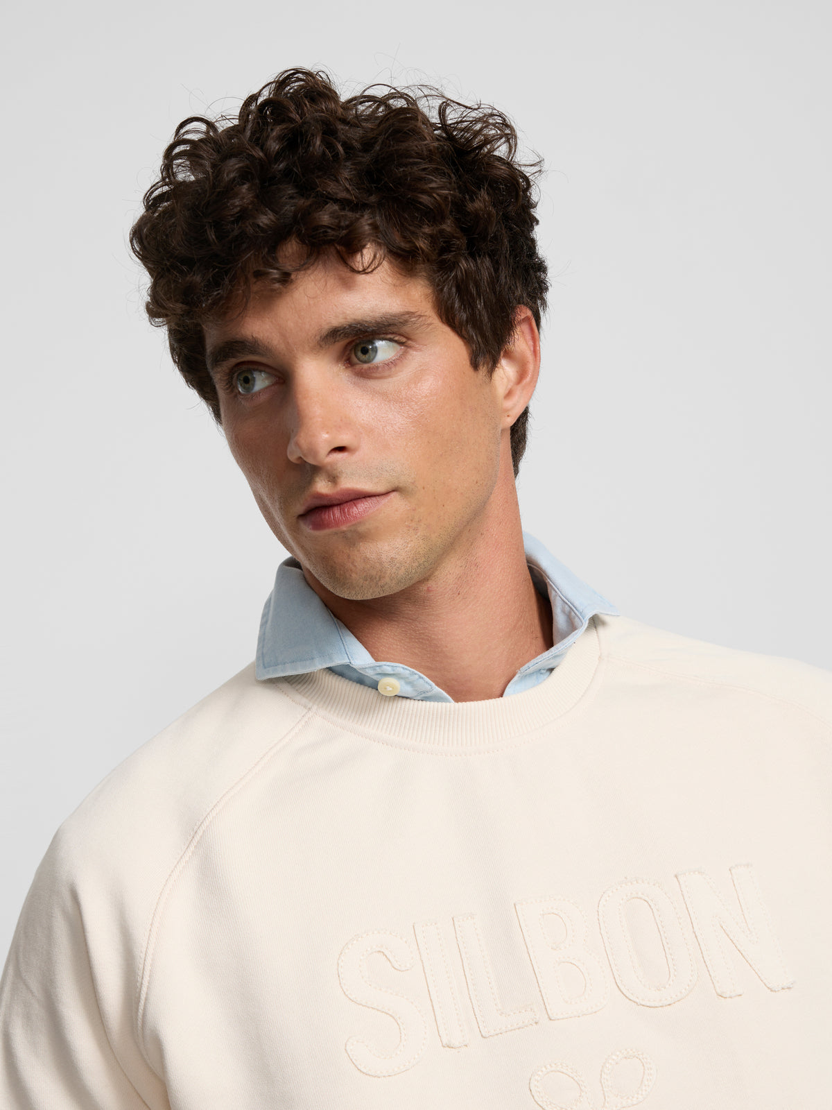 Sweatshirt raglã silbon patch creme