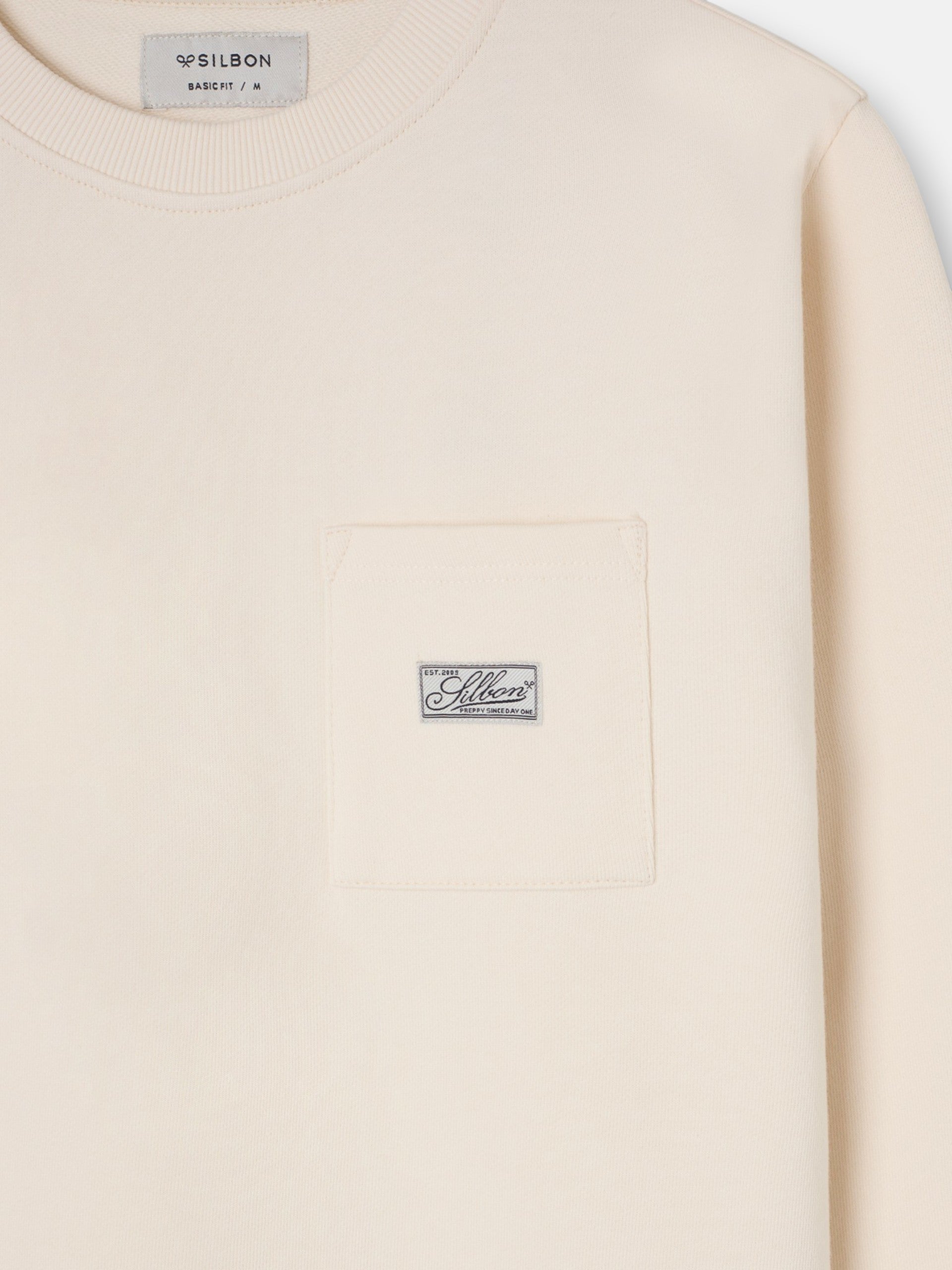 Sudadera bolsillo etiqueta crema