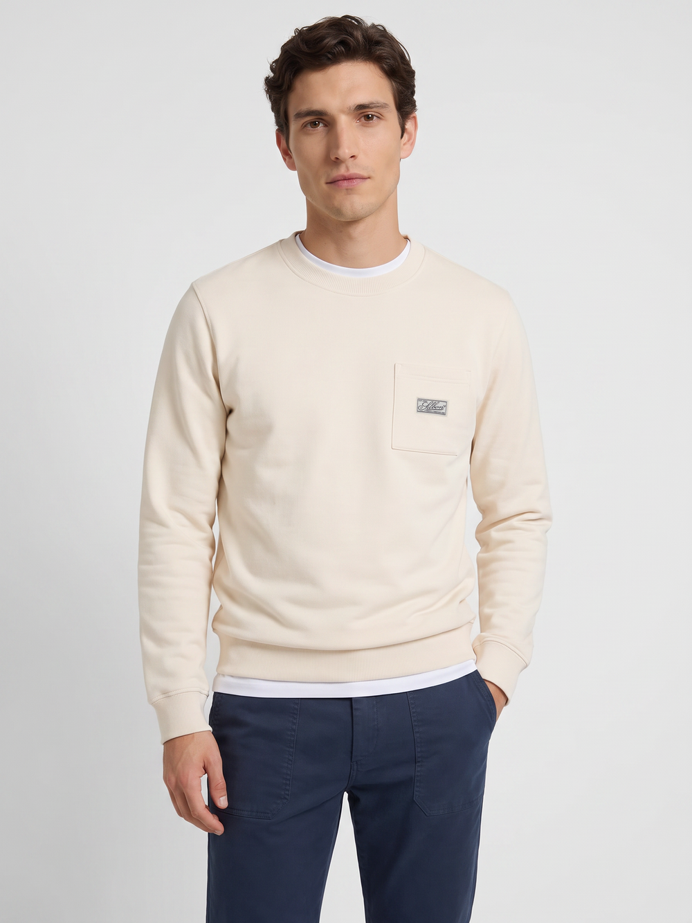 Sudadera bolsillo etiqueta crema