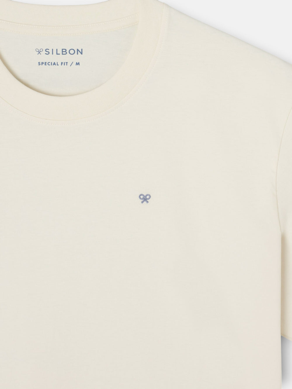 Camiseta special fit evolve to survive crema