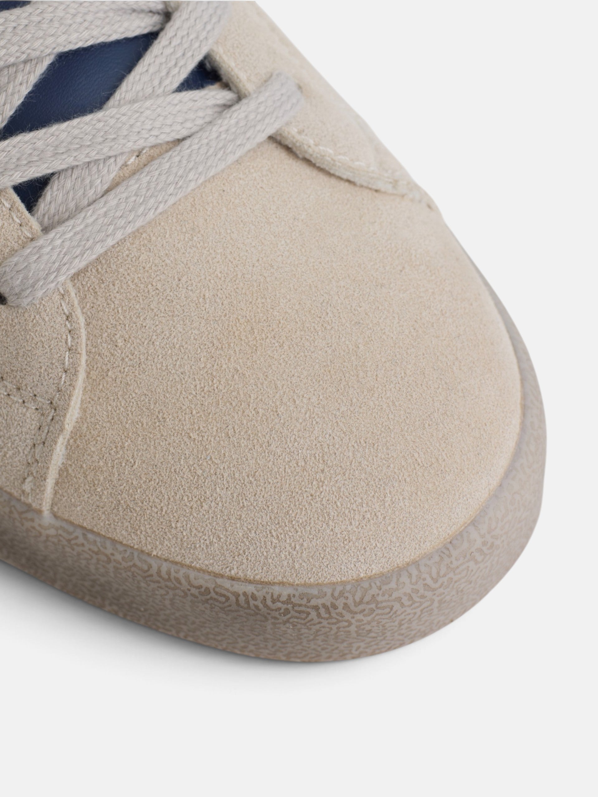 Beige worn suede sneaker