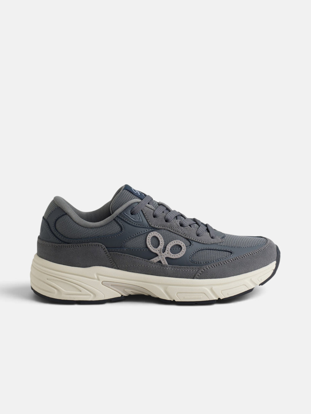 Zapatilla running tono gris