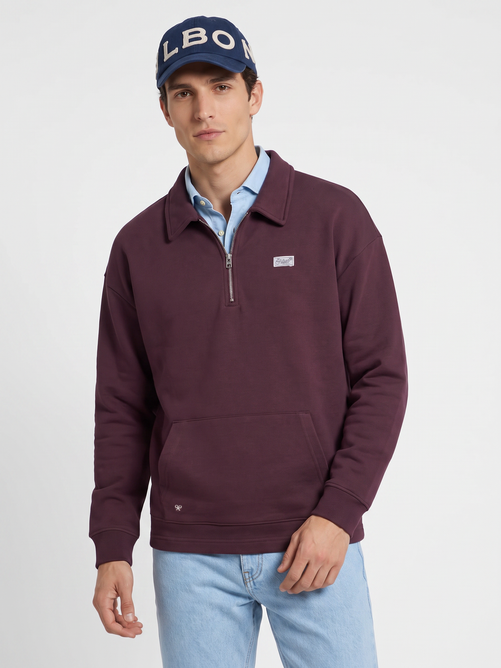 Sudadera relaxed fit media cremallera etiqueta burdeos