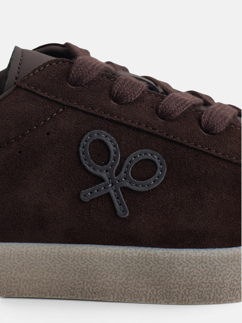 Worn brown suede sneaker