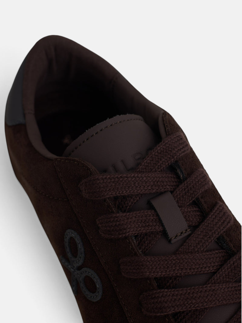 Worn brown suede sneaker