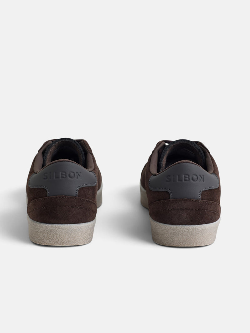 Worn brown suede sneaker