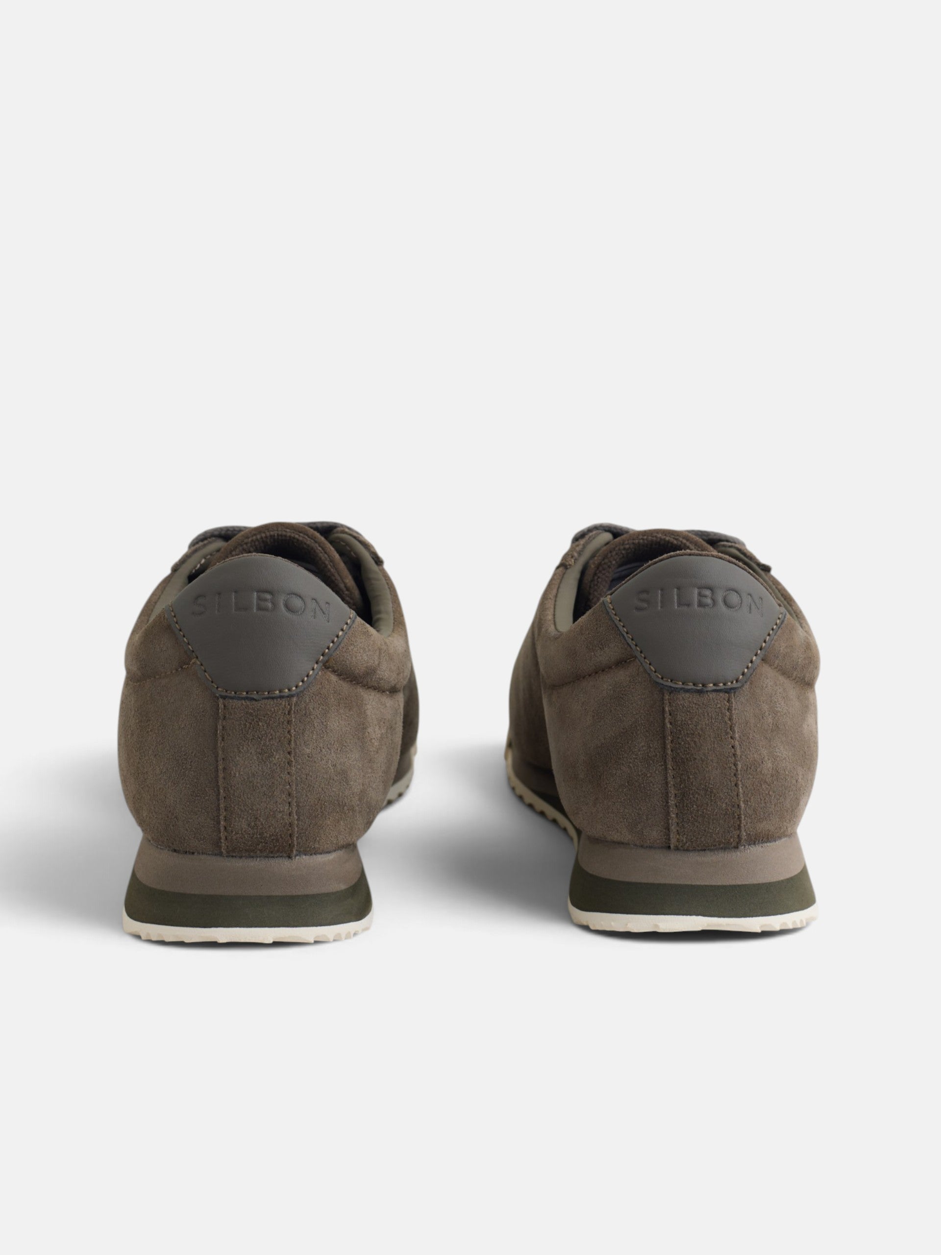 Brown suede sneaker with perforated logo