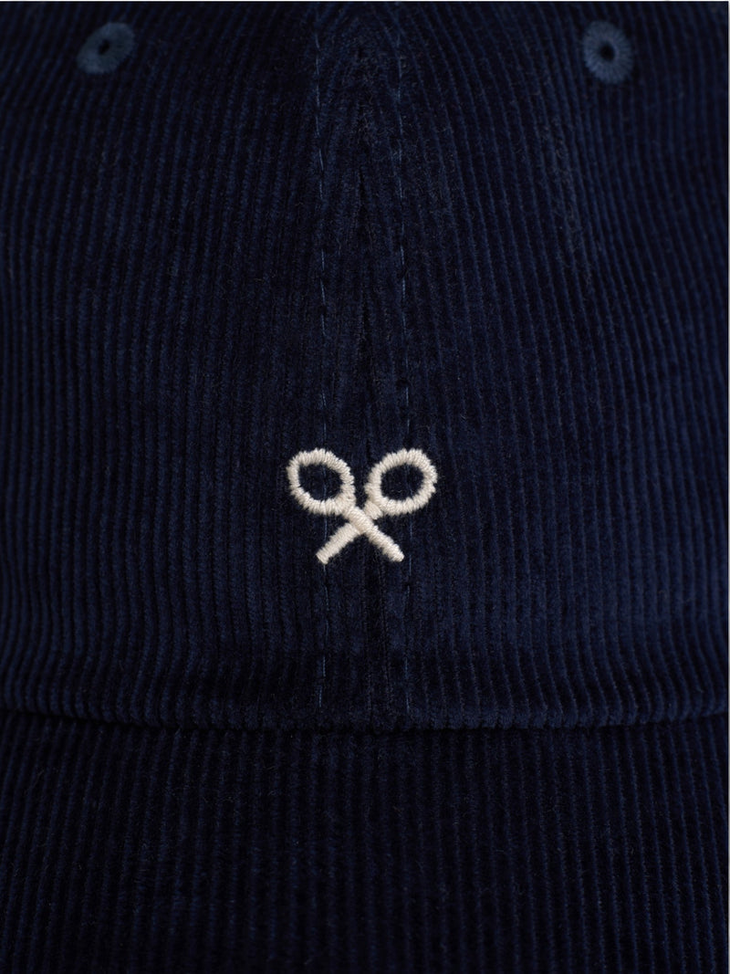 Navy blue corduroy cap with rackets