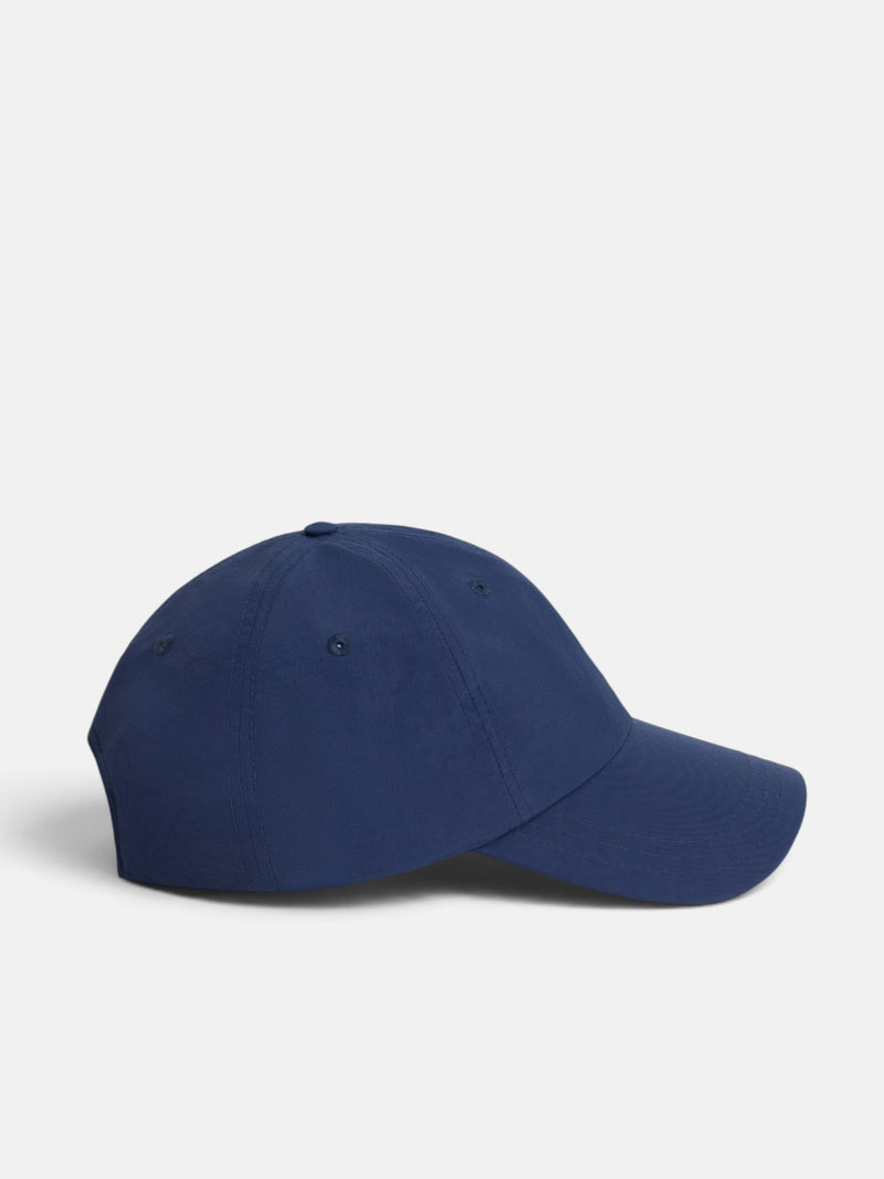 Navy blue technical fabric racket cap