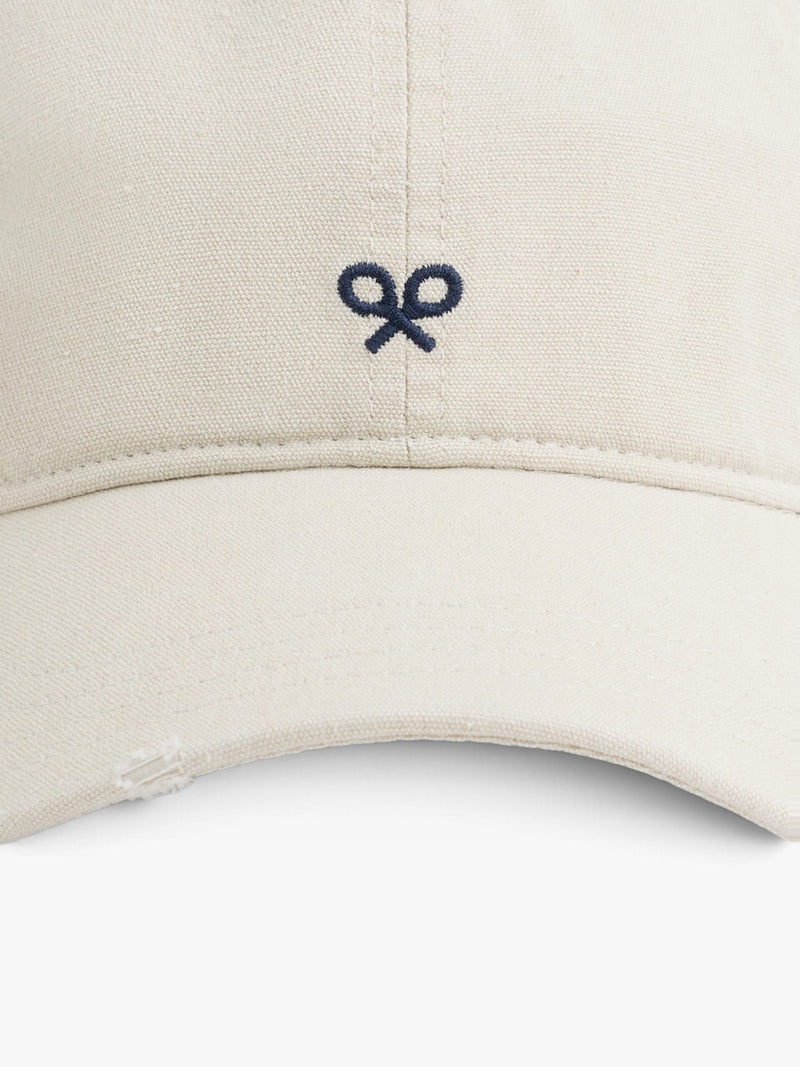 Gorra raquetas bordadas beige
