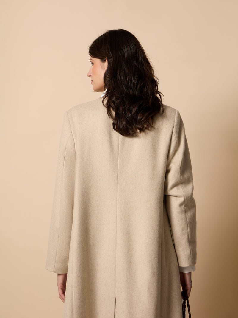 Long unique double-breasted beige coat