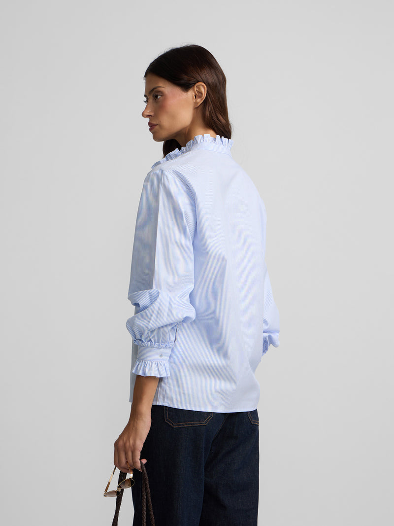 Camisa cuello volante detalle puño rayas celeste