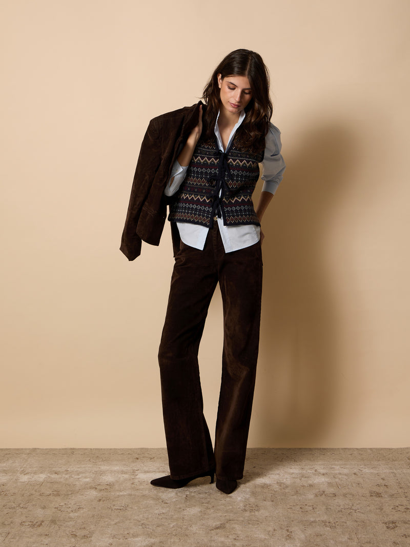 Unique jacquard knit vest with navy blue bows