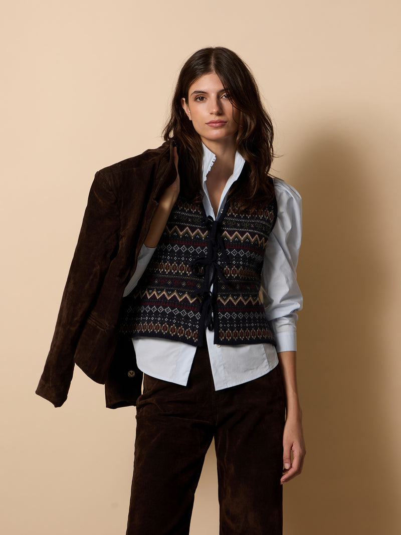 Unique jacquard knit vest with navy blue bows