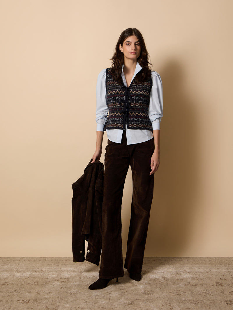 Unique jacquard knit vest with navy blue bows