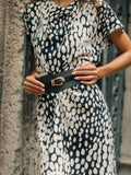 Vestido midi drapeado lunares blanco y negro