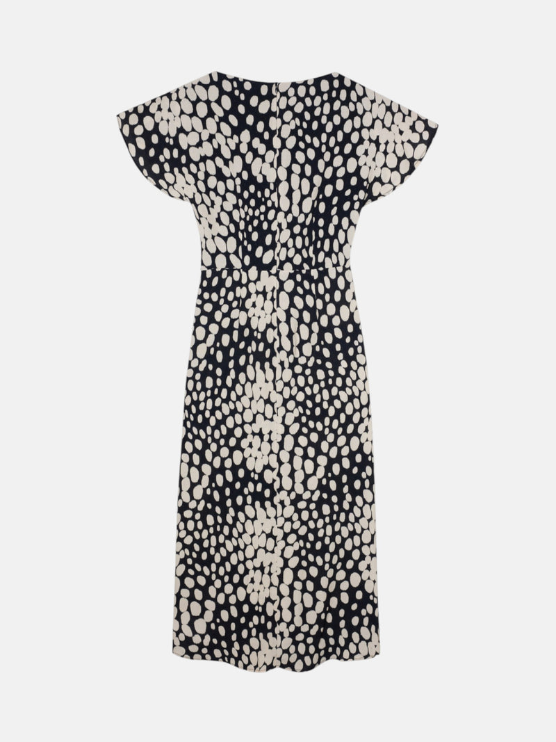 Vestido midi drapeado lunares blanco y negro
