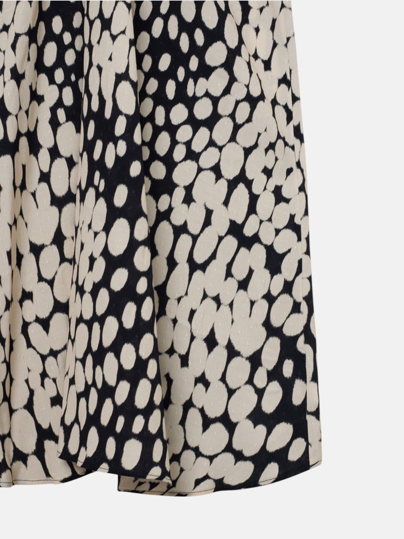 Vestido midi drapeado lunares blanco y negro