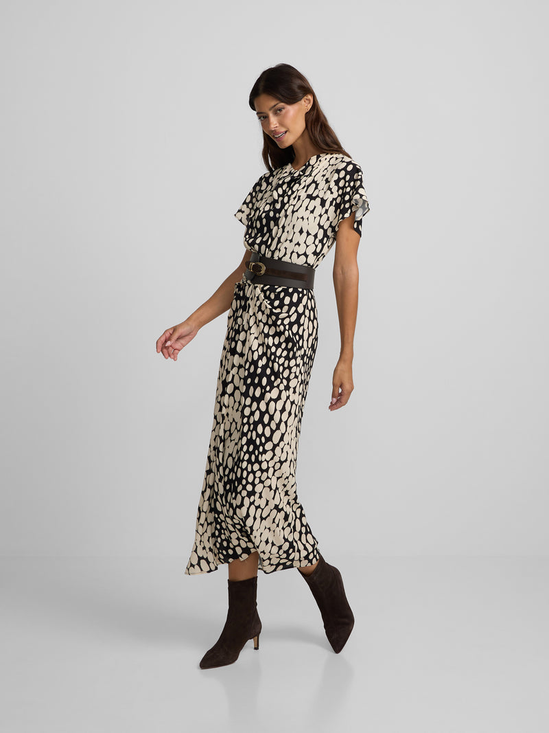 Vestido midi drapeado lunares blanco y negro