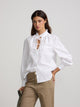 Camisa cuello alto lazos blanca