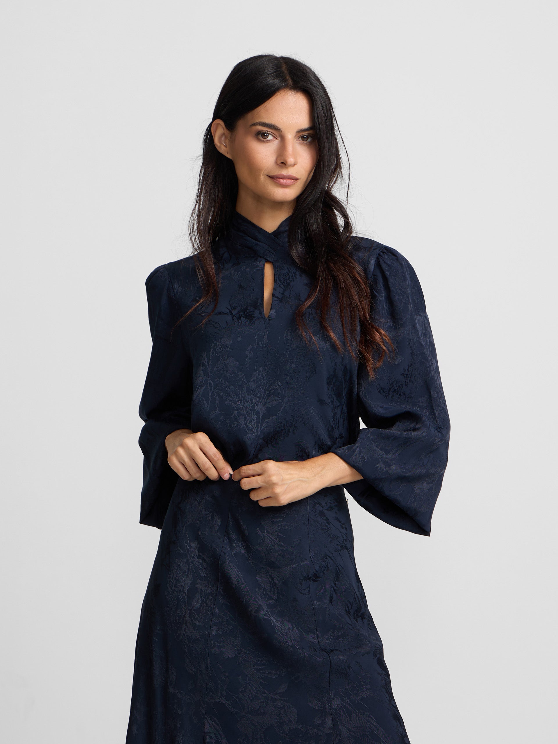 Blue jacquard neck strap blouse