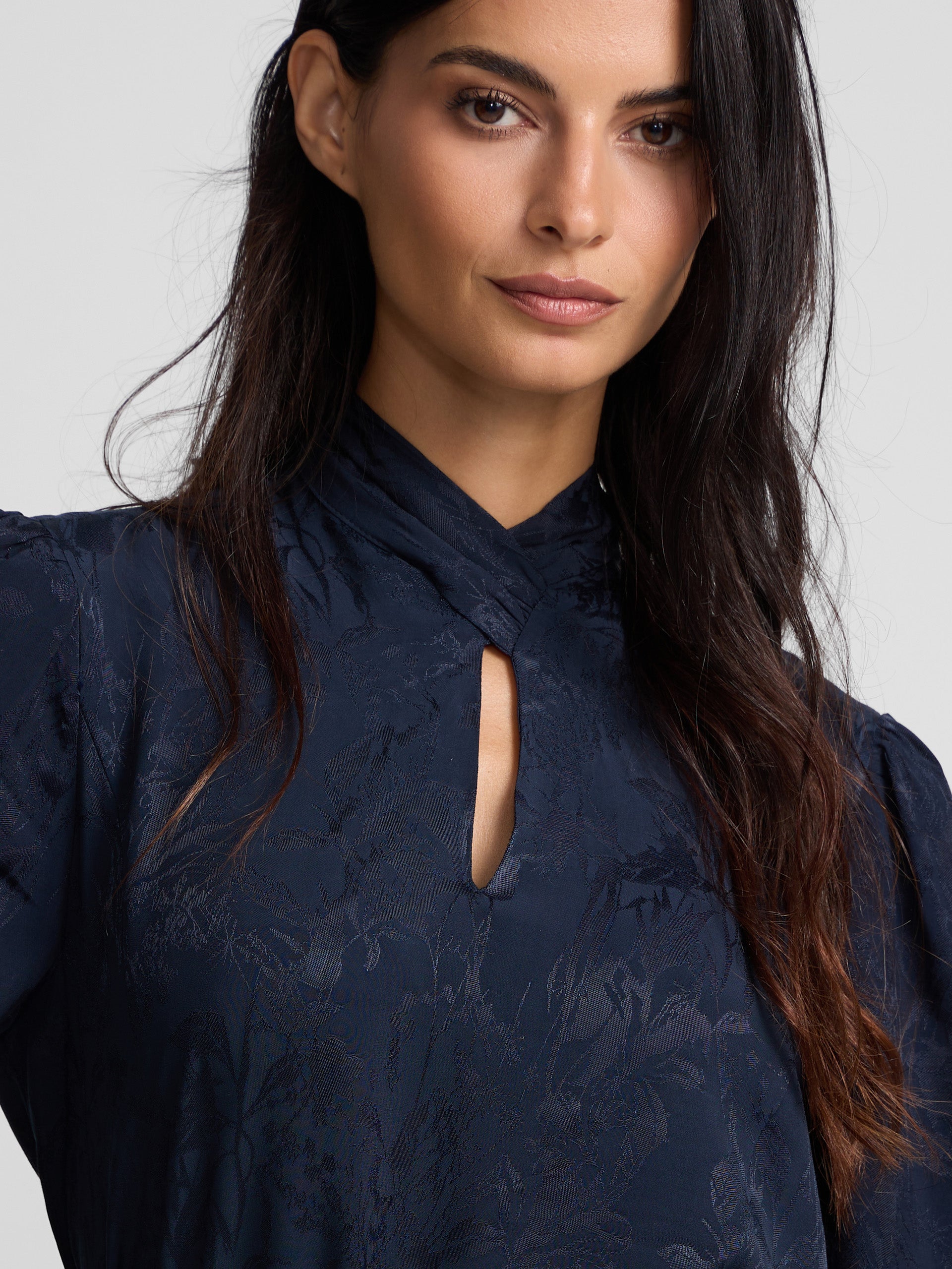 Blue jacquard neck strap blouse