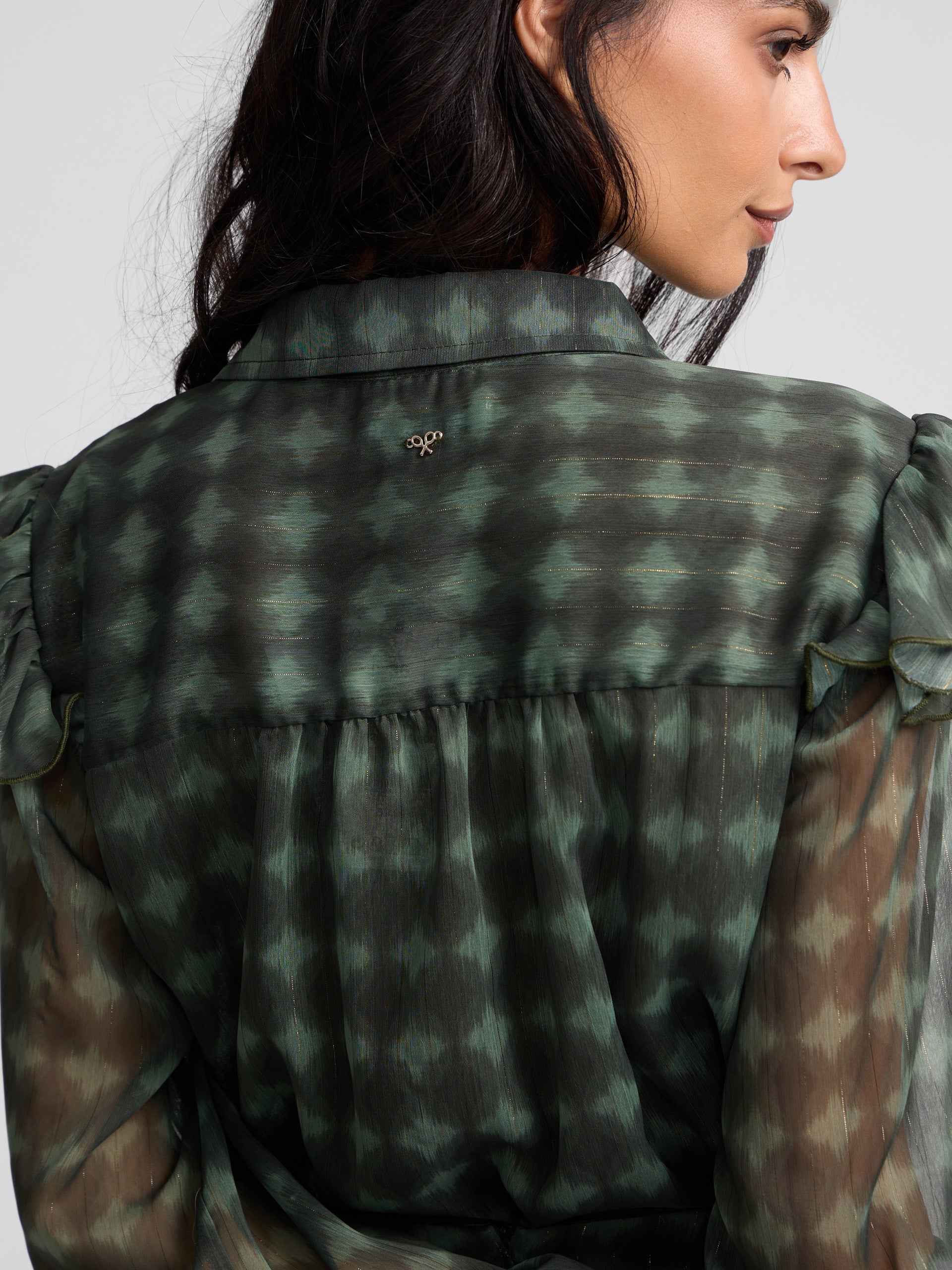 Green ethnic print ruffle blouse