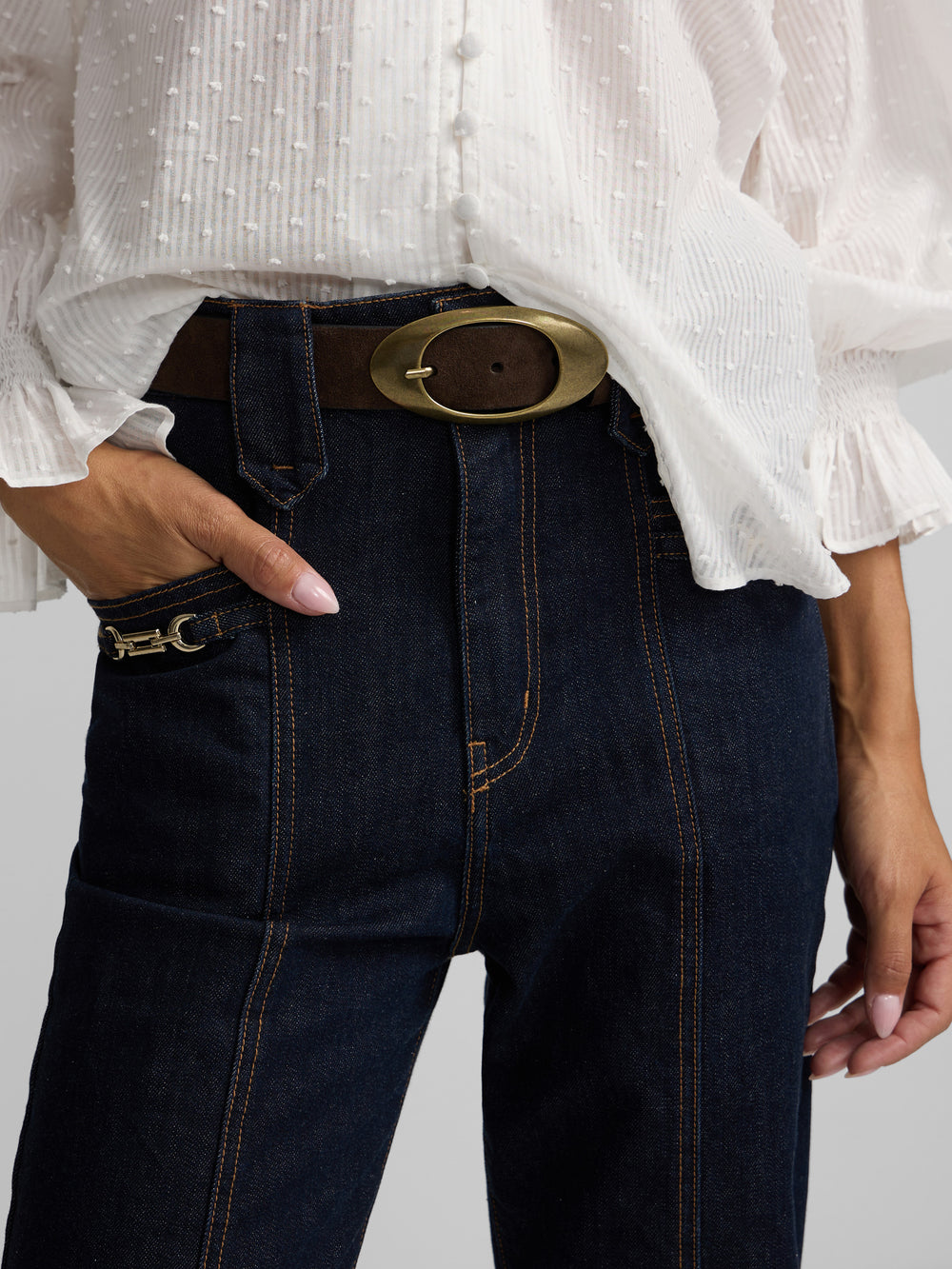 Straight denim trousers with buckle details denim