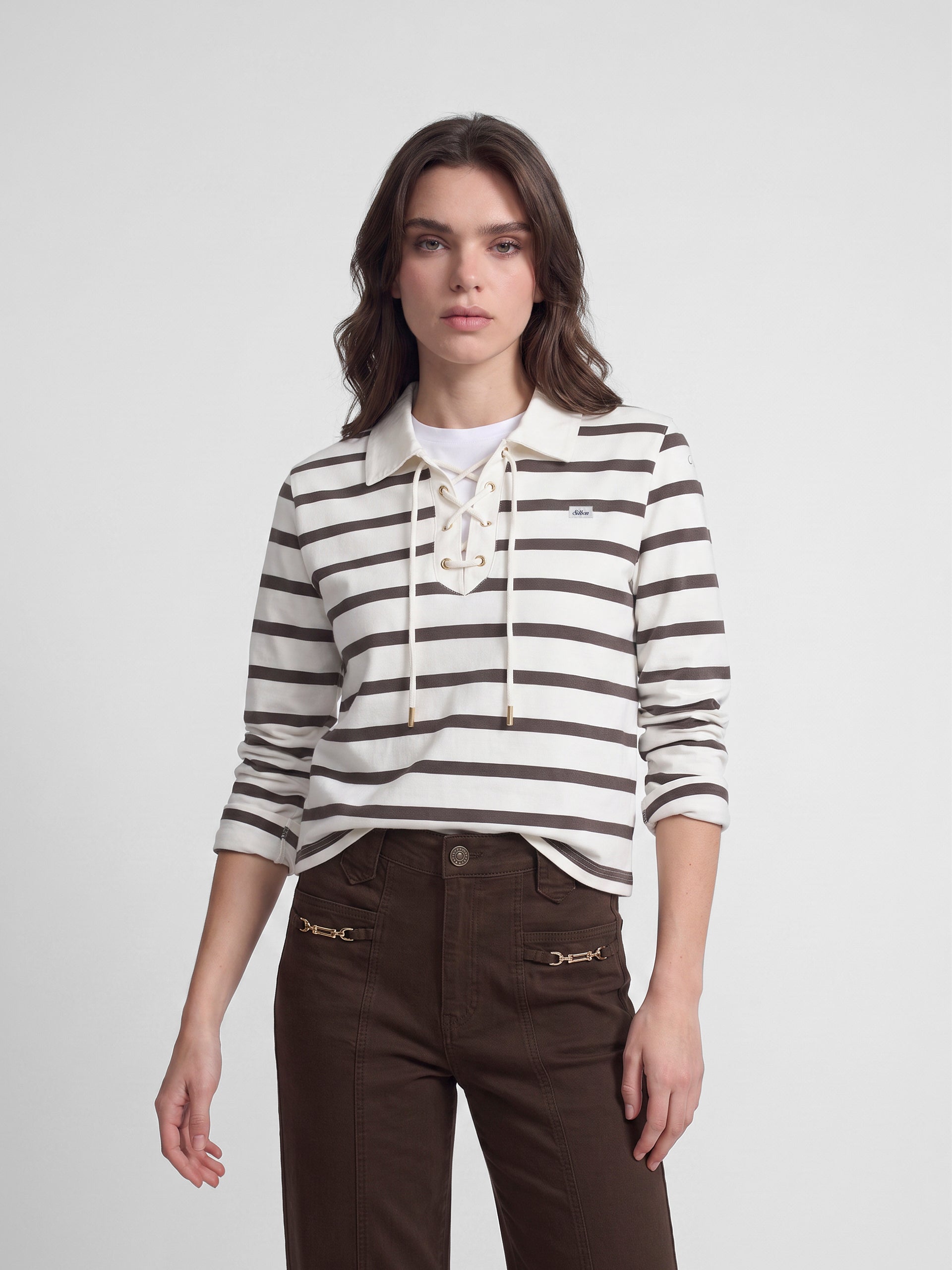 Long-sleeved women's polo shirt with raw stripes