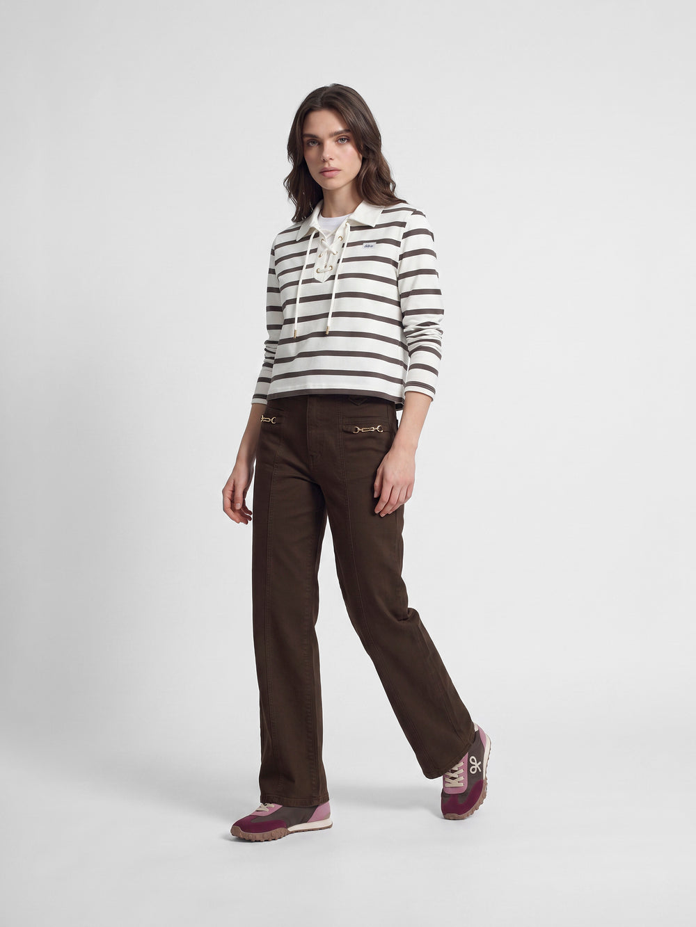 Long-sleeved women's polo shirt with raw stripes