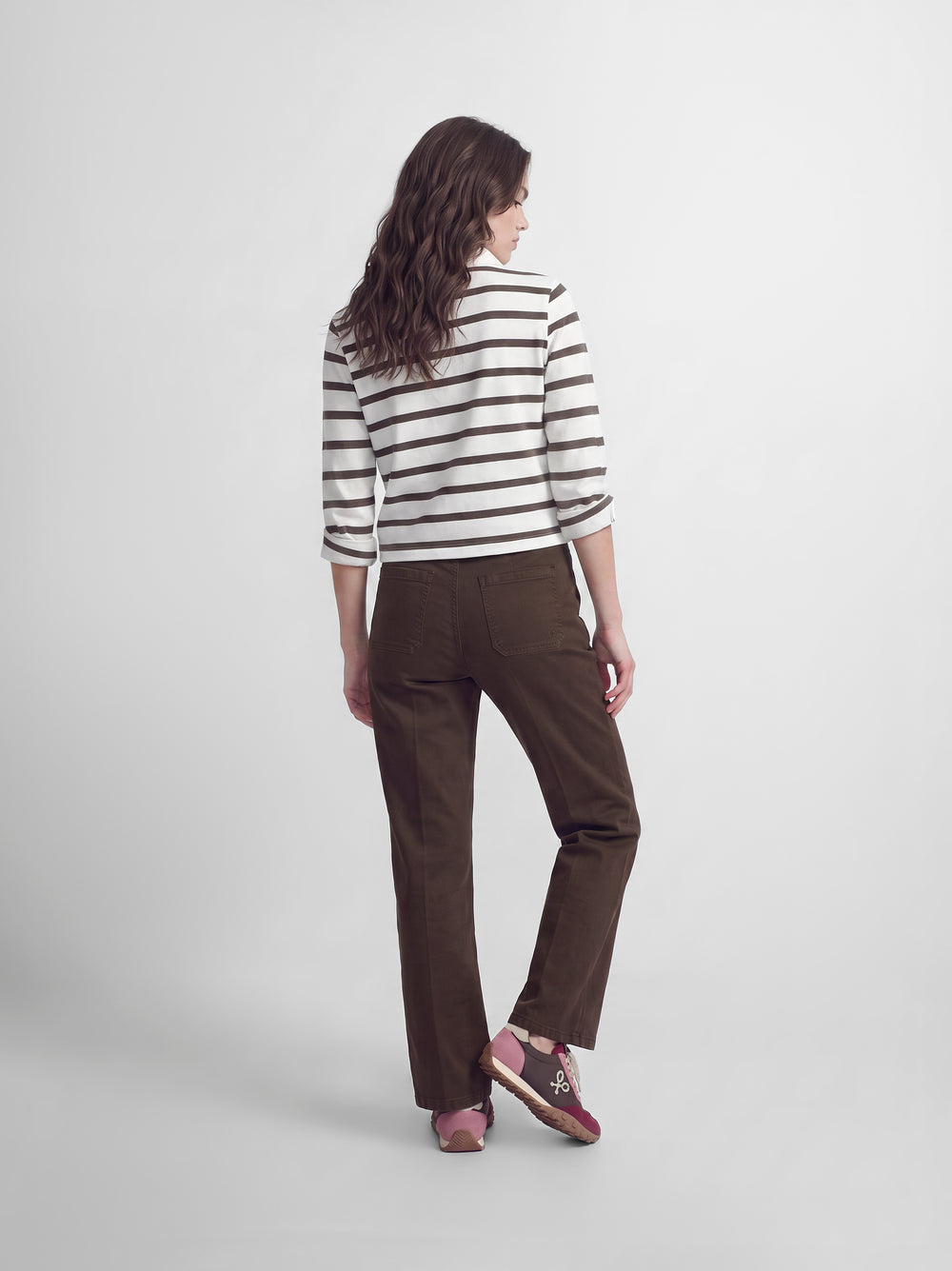 Long-sleeved women's polo shirt with raw stripes