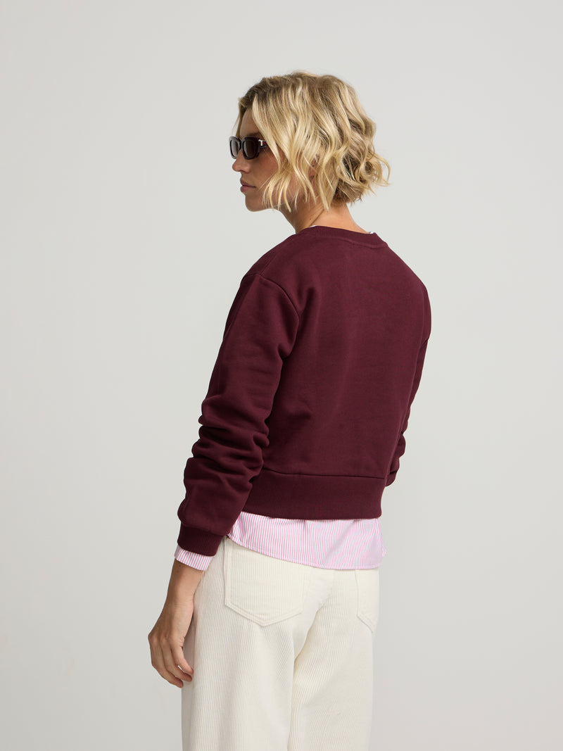 Sweatshirt mulher com bainha de camisa bordô