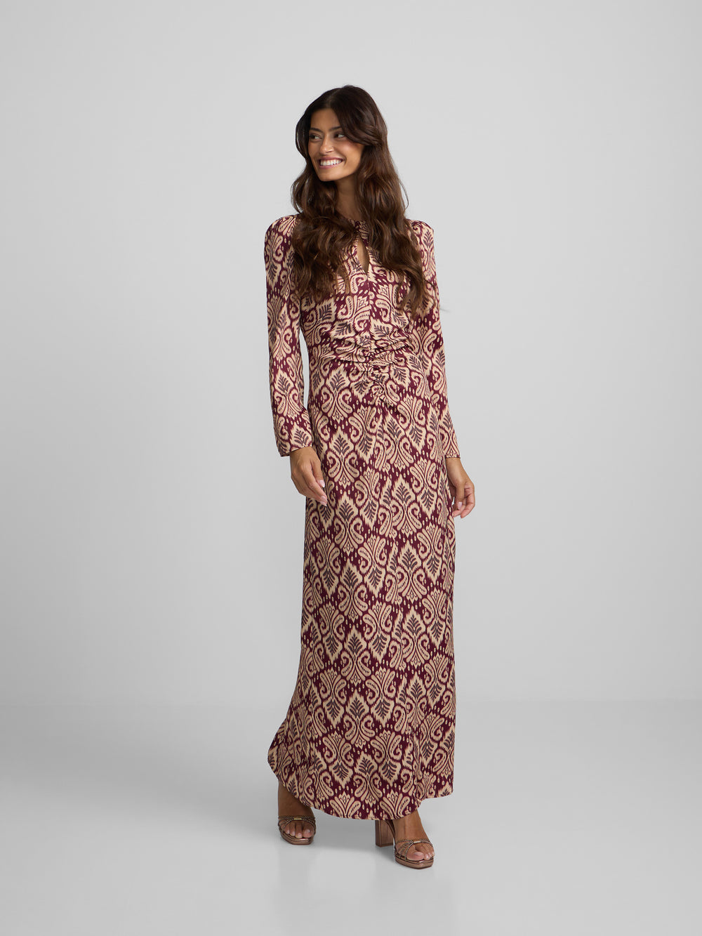 Long draped dress with garnet ikat print