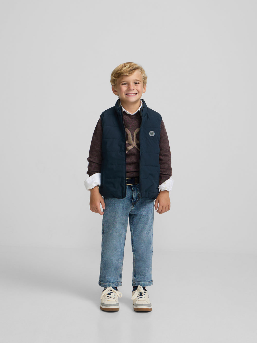 Kids reversible vest with navy green pockets