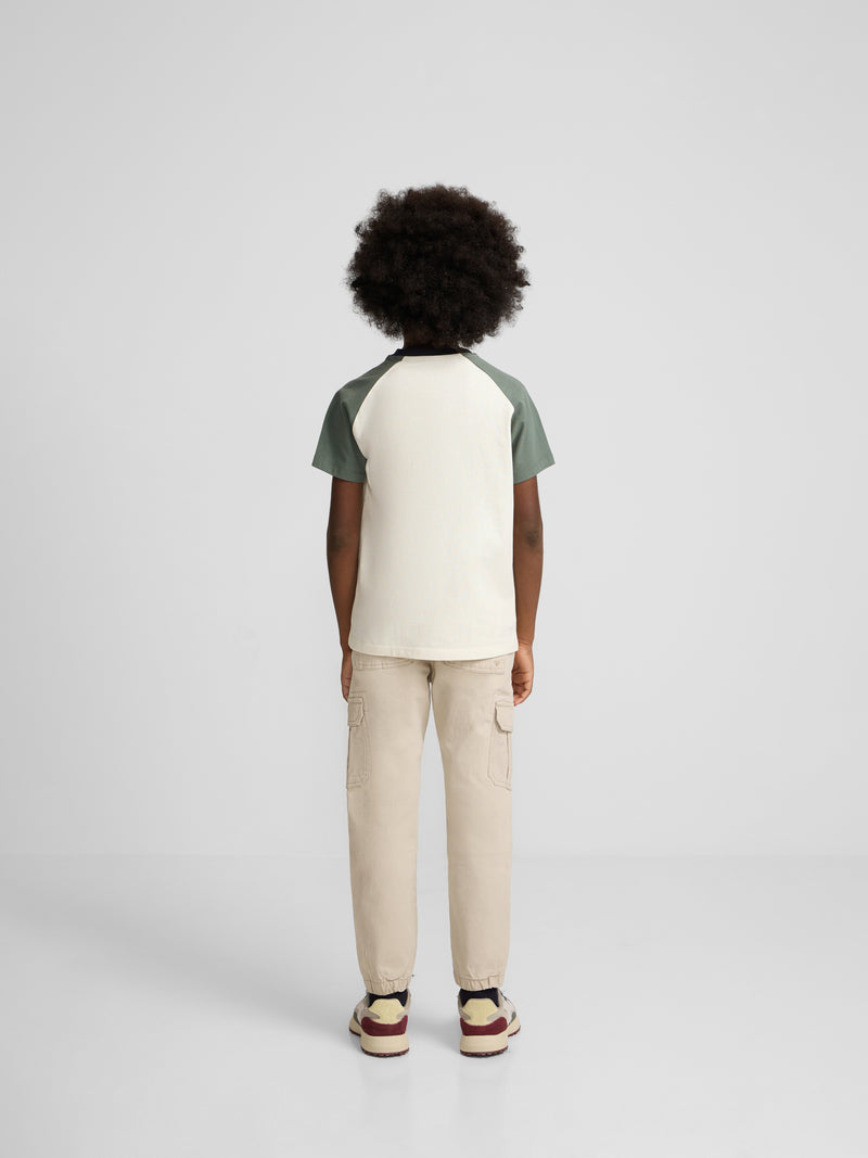 Camiseta kids ranglan varsity verde oscuro