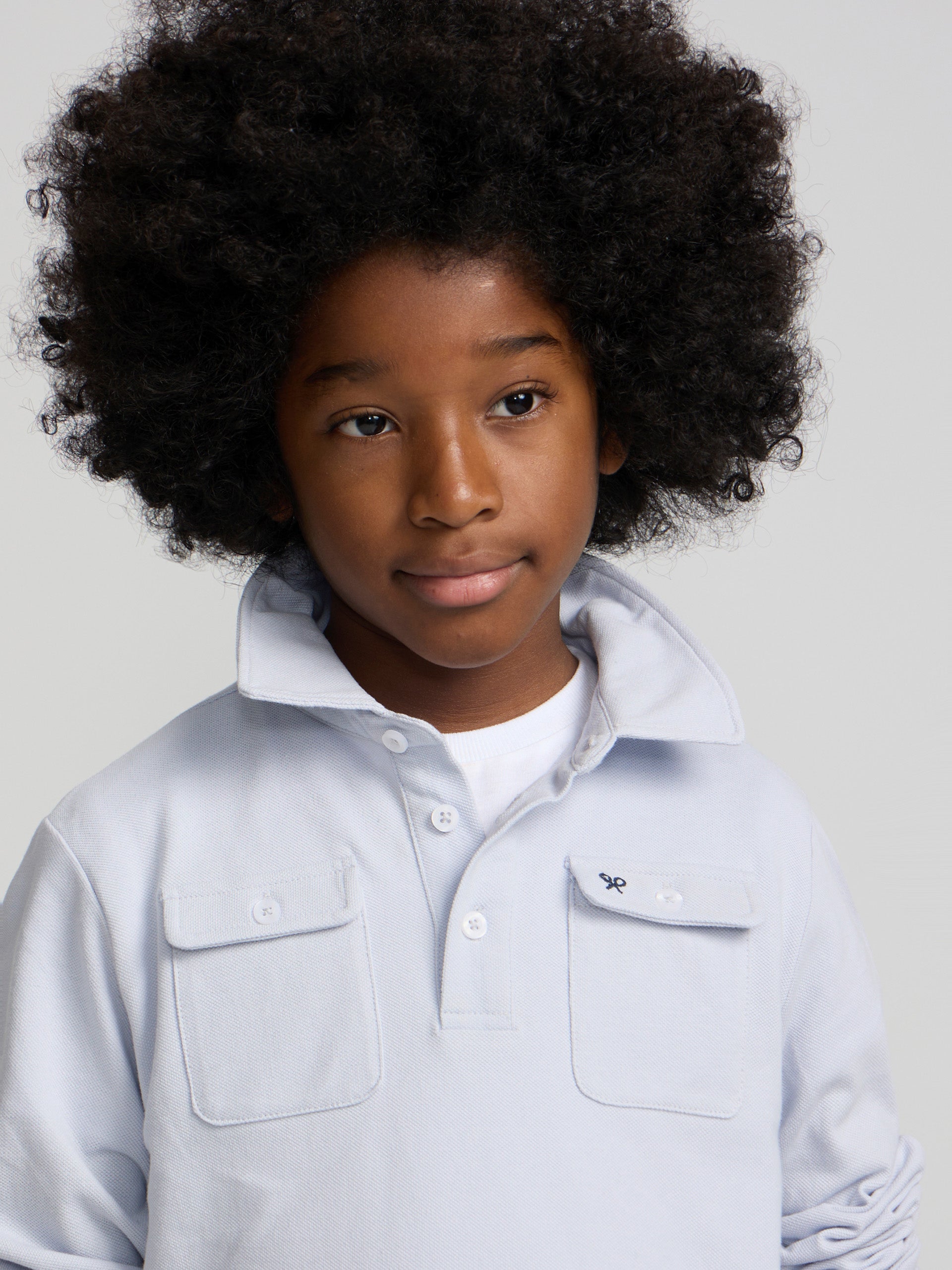 Kids' blue polo with pockets