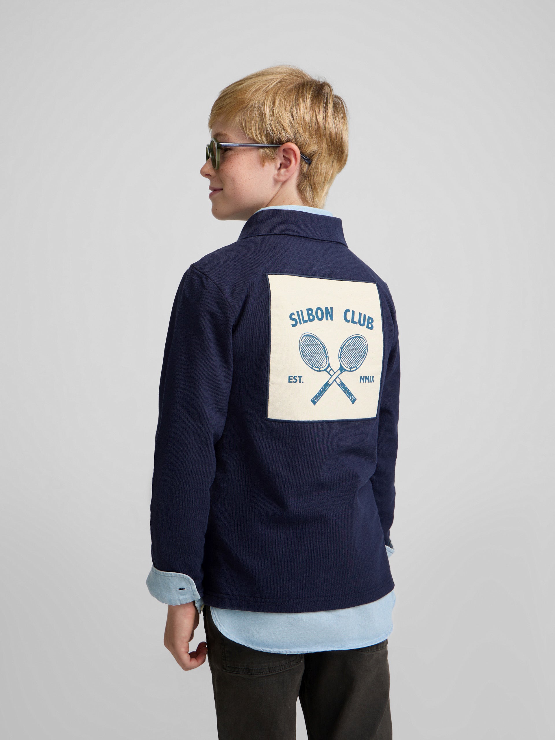 Polo enfant patch bleu marine
