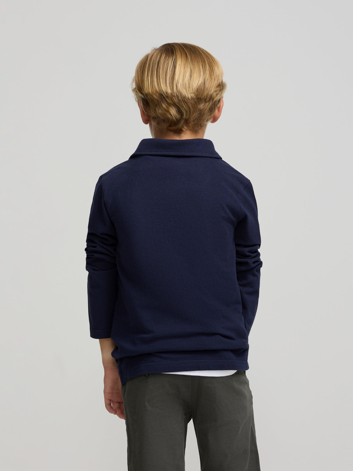 Navy blue kids' polo with patches