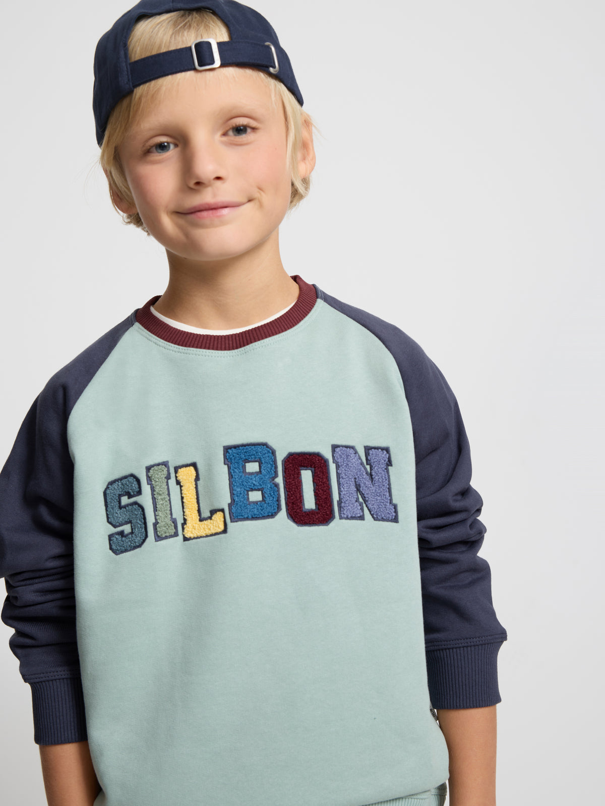 Sweatshirt kids raglan varsity azul-marinho