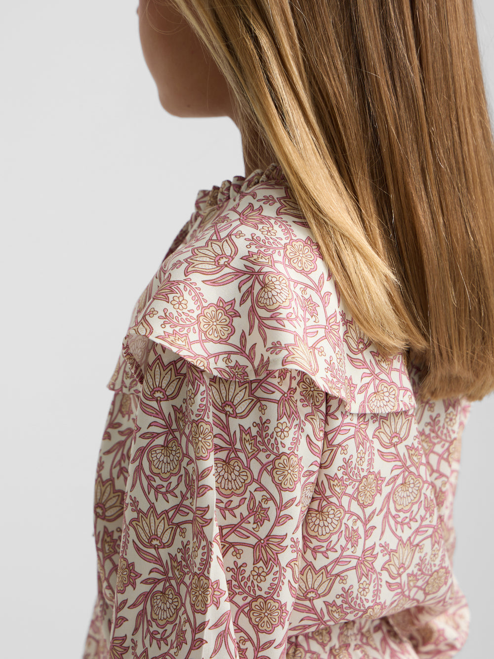 Girl's blouse with pink and white floral print