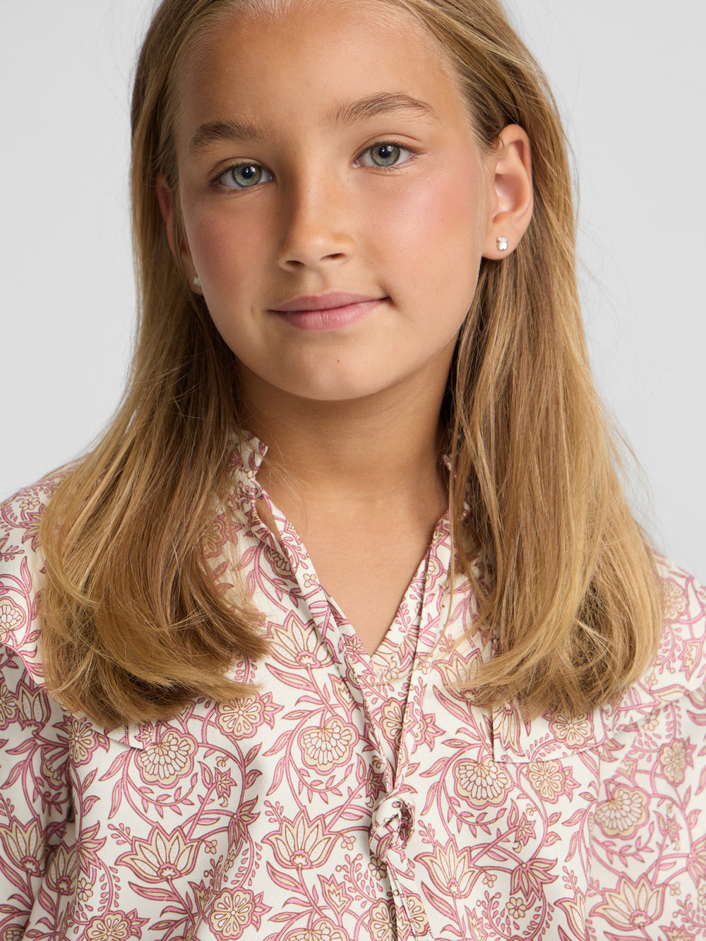 Girl's blouse with pink and white floral print