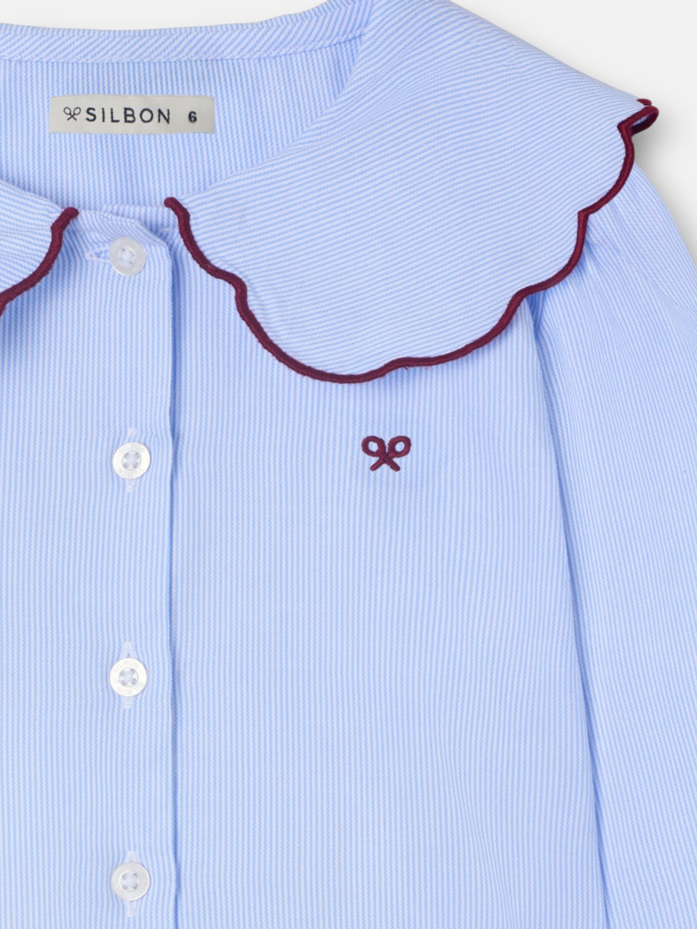 Girl's shirt with Peter Pan collar, light blue stripes