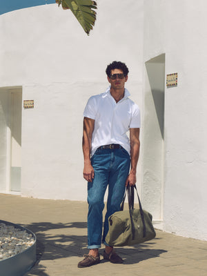 Pantalon de sport en denim bleu foncé coupe fuselée